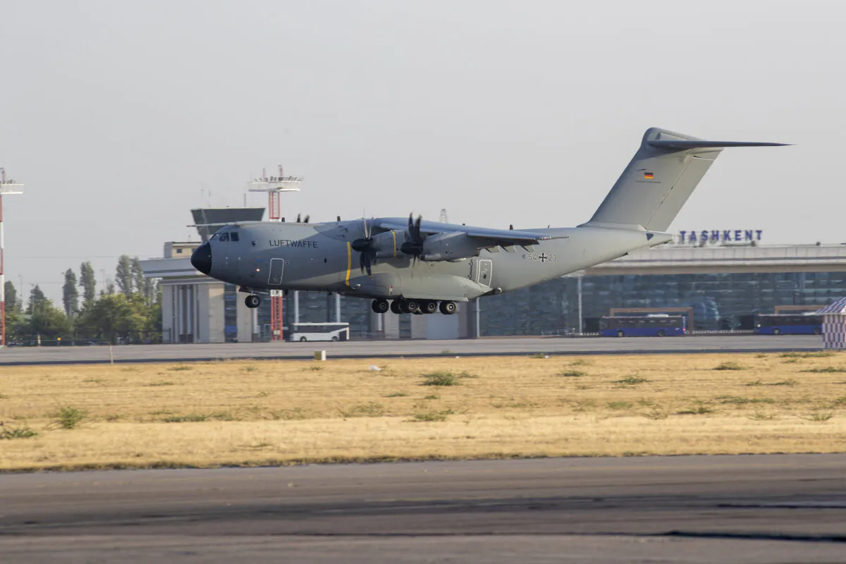 In this handout image provided by the Bundeswehr, a military aircraft arrives at Tashkent Airport carrying evacuees from Kabul in Tashkent, Uzbekistan, on Aug. 17, 2021. (Marc Tessensohn/Bundeswehr via Getty Images)