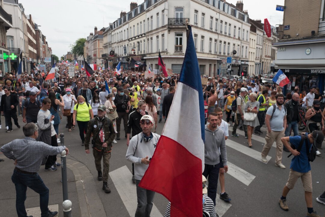 French Virus Health Pass in Full Use but Protests Keep Going