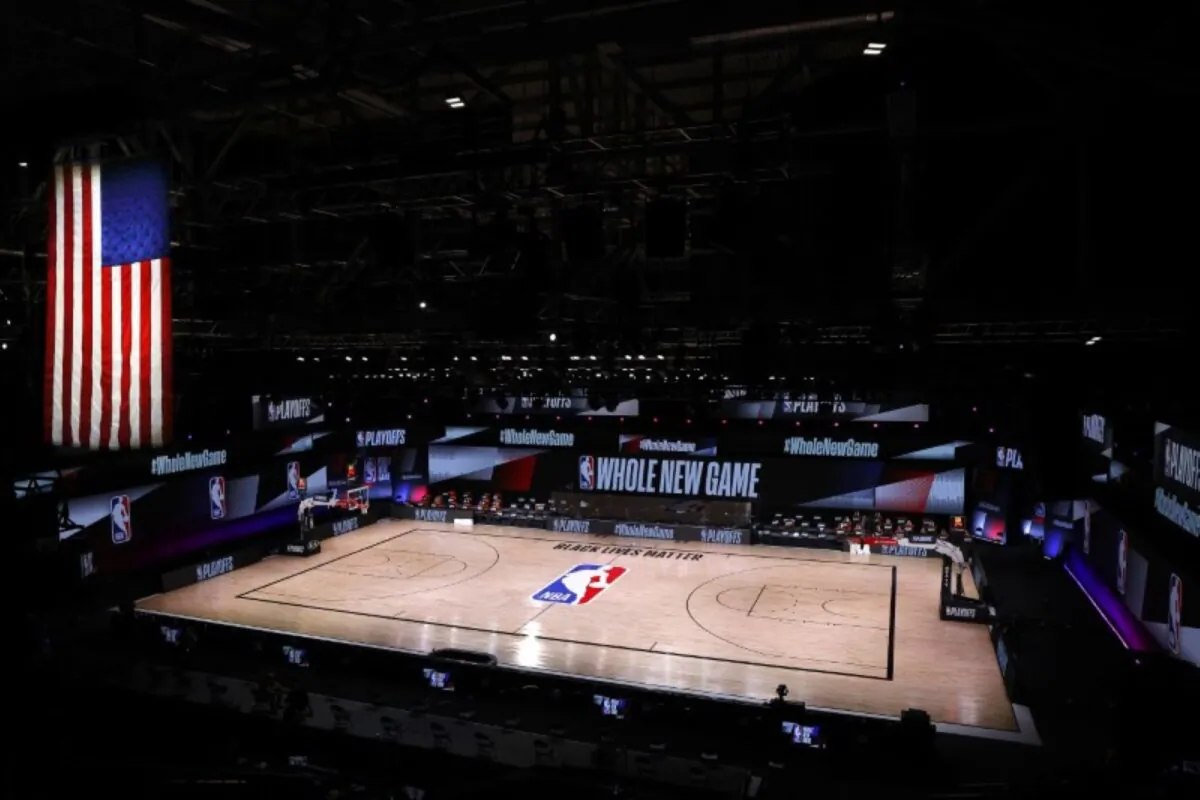 An empty court and bench is shown following the scheduled start time in Game Five of the Eastern Conference First Round between the Milwaukee Bucks and the Orlando Magic during the 2020 NBA Playoffs at AdventHealth Arena at ESPN Wide World Of Sports Complex in Lake Buena Vista, Fla., on Aug. 26, 2020. (Kevin C. Cox/Pool Photo/File/USA TODAY Sports)