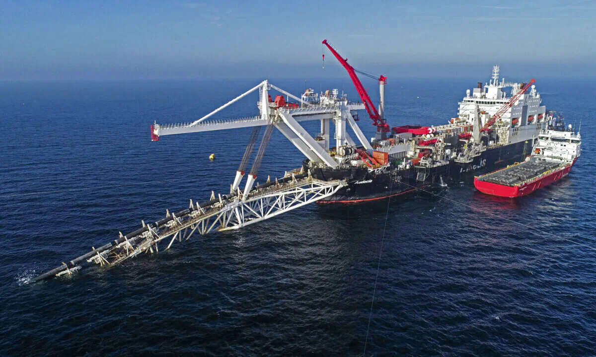 A ship works offshore in the Baltic Sea on the natural gas pipeline Nord Stream 2 from Russia to Germany on Nov. 11, 2018. (Bernd Wuestneck/dpa via AP)