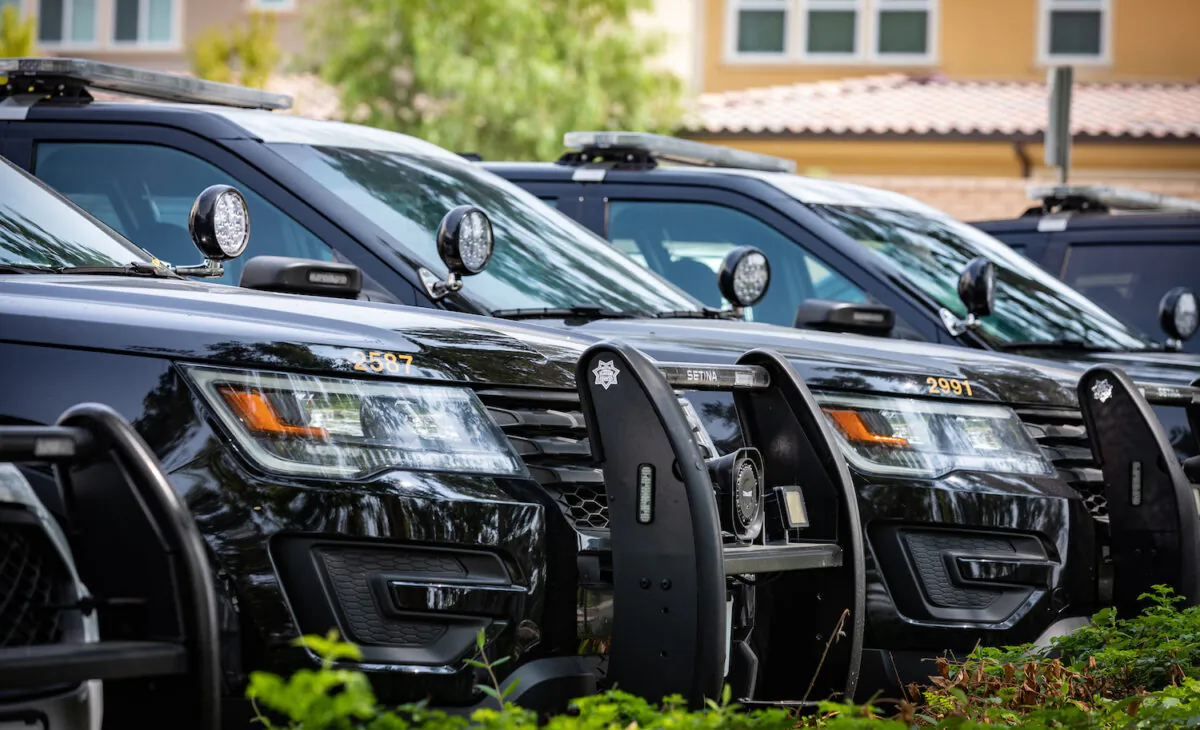 In this file photo, police cars are shown in Lake Forest, Calif., on Sept. 14, 2020. (John Fredricks/The Epoch Times)
