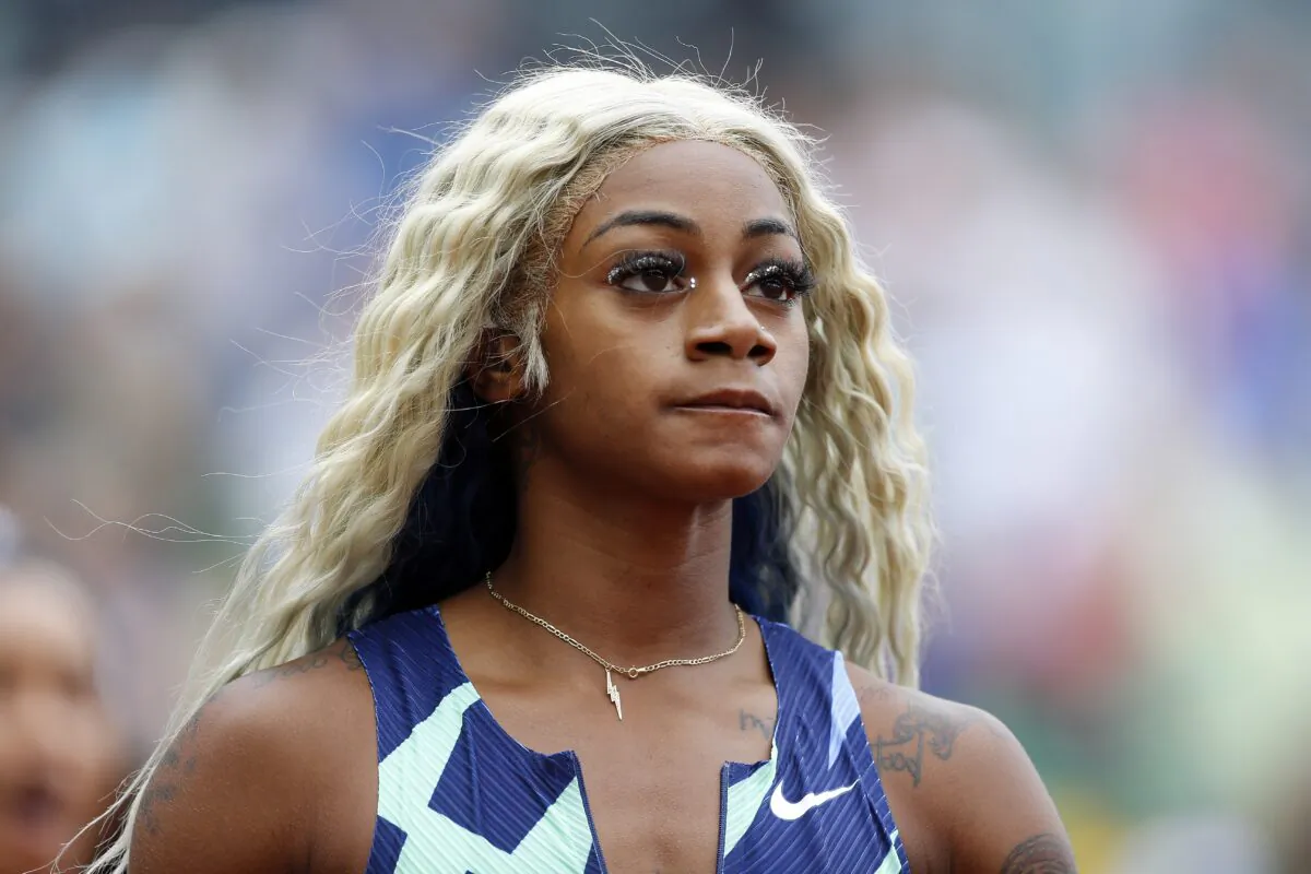 Sha'Carri Richardson reacts after finishing last in the 100m race during the Wanda Diamond League Prefontaine Classic at Hayward Field, in Eugene, Ore., on Aug. 21, 2021. (Jonathan Ferrey/Getty Images)
