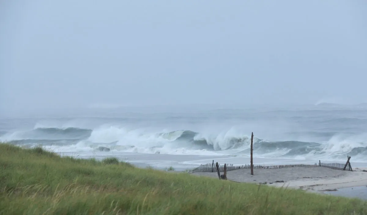 Waves hit the shore at Ponquogue Beach as Hurricane Henri, now downgraded to a tropical storm, nears the coast in Long Island, N.Y., on Aug. 22, 2021. (Caitlin Ochs/Reuters)