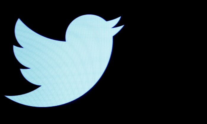 The Twitter logo is displayed on a screen on the floor of the New York Stock Exchange (NYSE) on Sep. 28, 2016. (Brendan McDermid/Reuters)