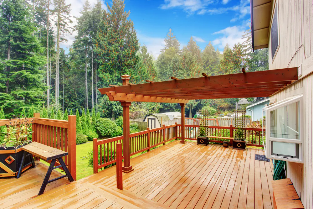 One of the most common and easy-to-build shading systems is a trellis-style structure that covers the top of the deck.(Artazum/Shutterstock)