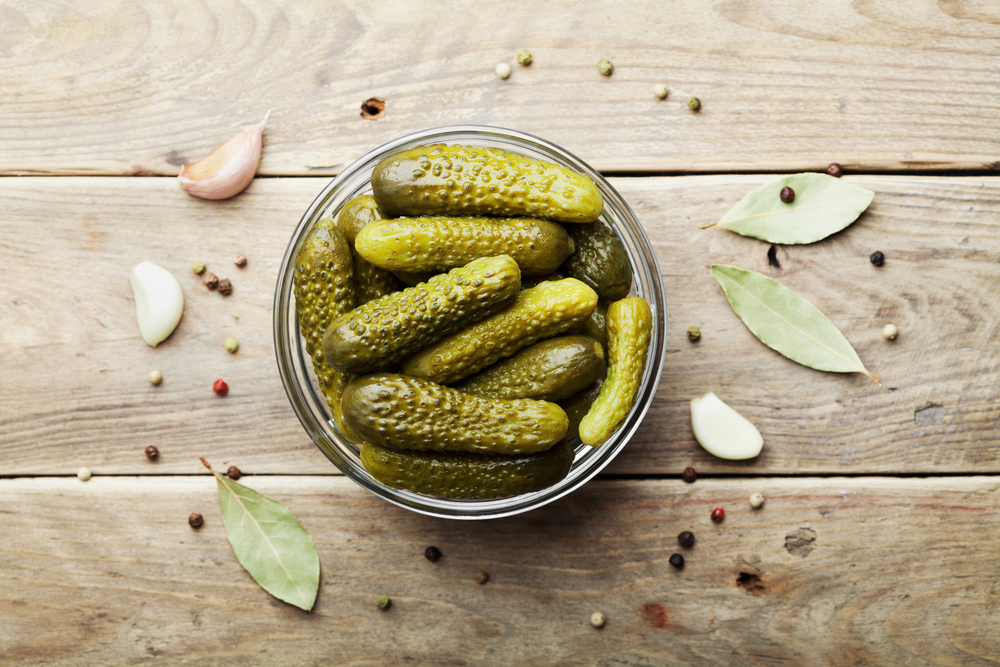 Pickled,Gherkins,Or,Cucumbers,In,Bowl,On,Wooden,Rustic,Table