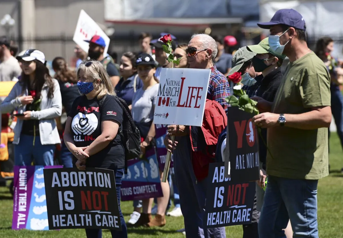 People take part in a “March For Life” against abortion on Parliament Hill in Ottawa on May 13, 2021. (The Canadian Press/Sean Kilpatrick)