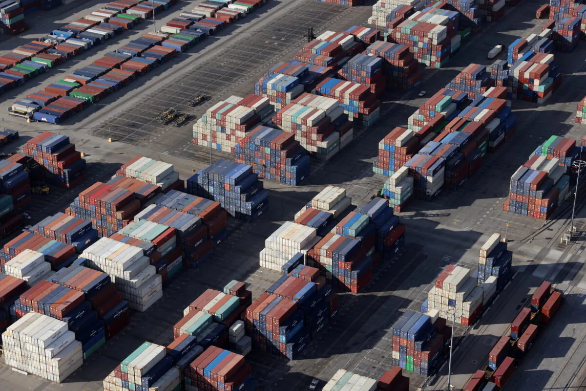 Shipping containers sit on the dock at a container terminal at the Port of Long Beach-Port of Los Angeles complex, in Los Angeles on April 7, 2021. (REUTERS/Lucy Nicholson/File Photo)