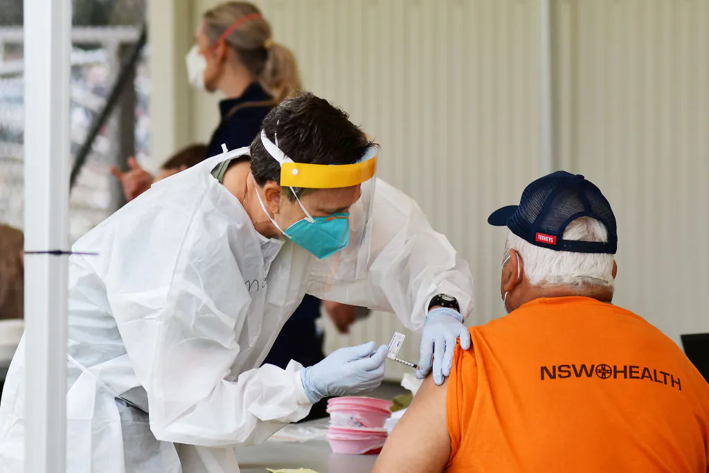 A man receives a dose of a COVID-19 vaccine at a newly opened vaccination hub in Dubbo, NSW, Australia, on Aug. 21, 2021. (Belinda Soole/Getty Images)