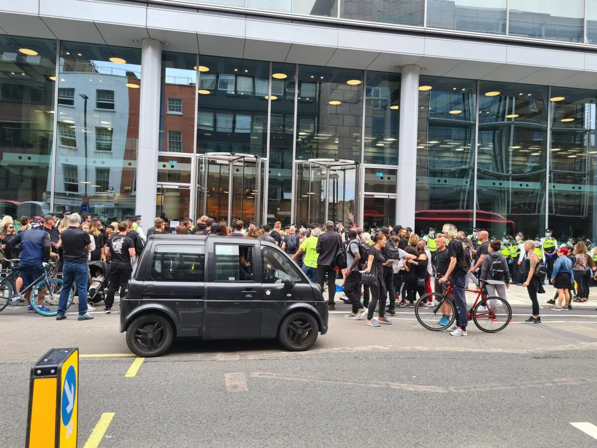 Crowds of protesters outside ITN’s headquarters in Camden, London, on Aug. 23, 2021 (Nico Hogg/PA)