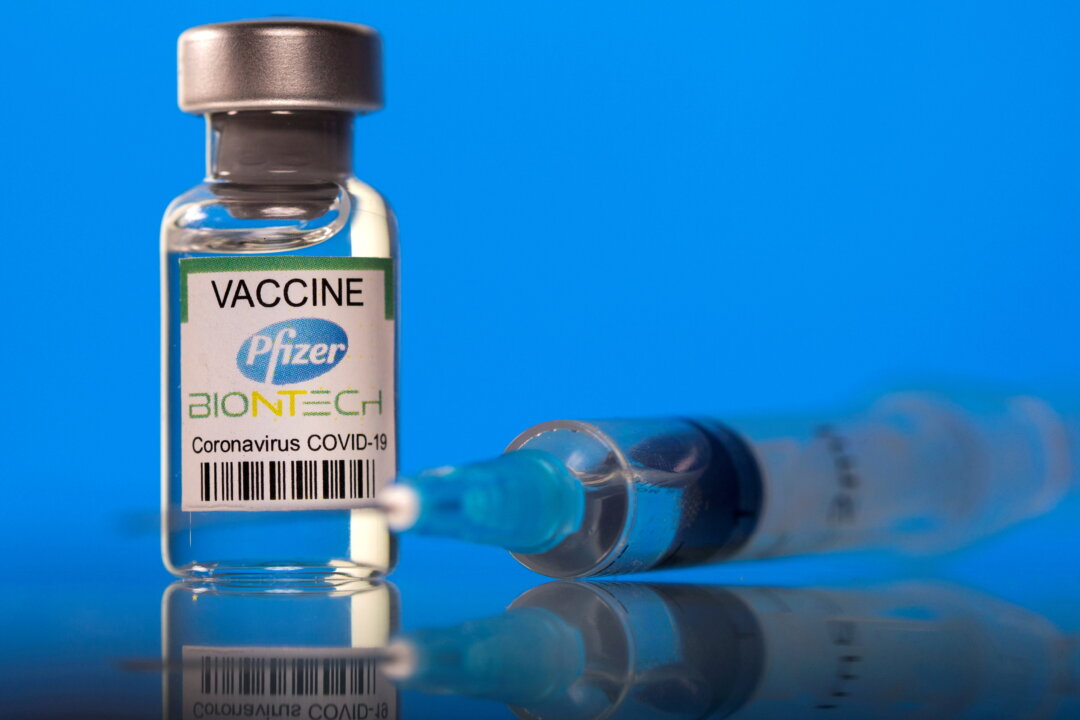 A vial labeled with the Pfizer-BioNTech coronavirus disease (COVID-19) vaccine is seen in this illustration picture taken on March 19, 2021. (Dado Ruvic/Illustration/Reuters)