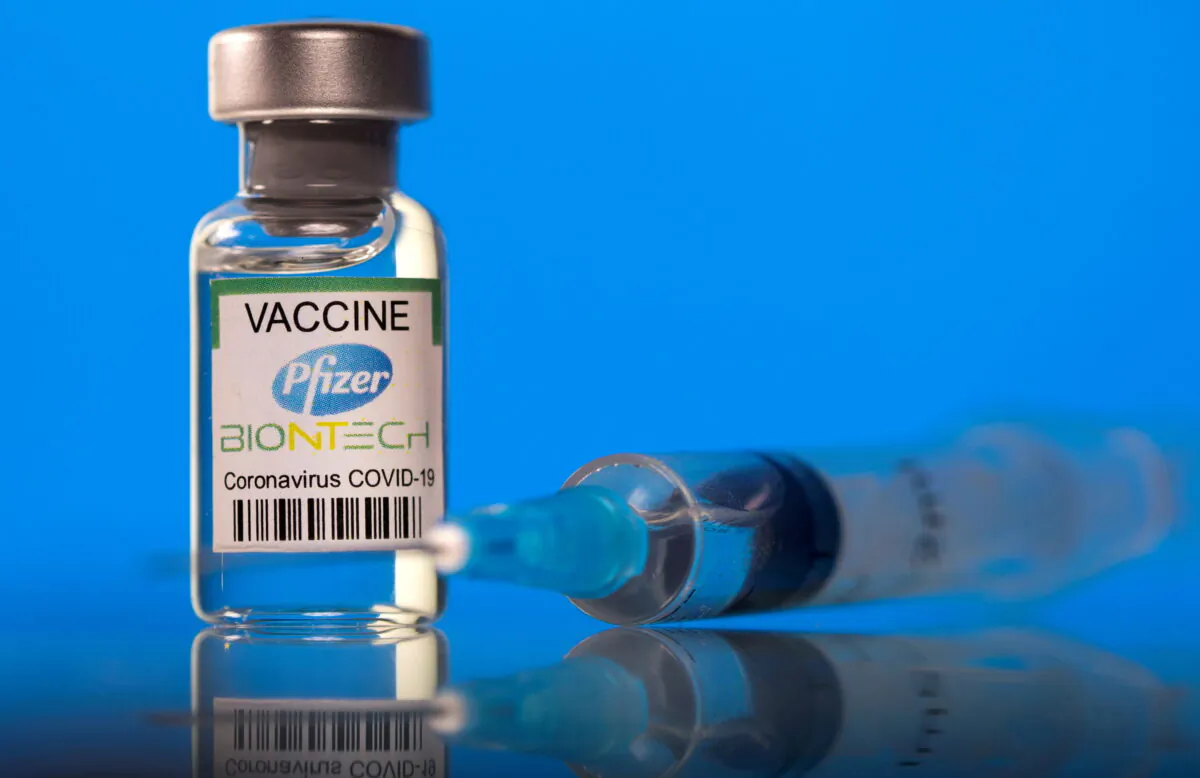 A vial labeled with the Pfizer-BioNTech coronavirus disease (COVID-19) vaccine, on March 19, 2021. (Dado Ruvic/Illustration/Reuters)