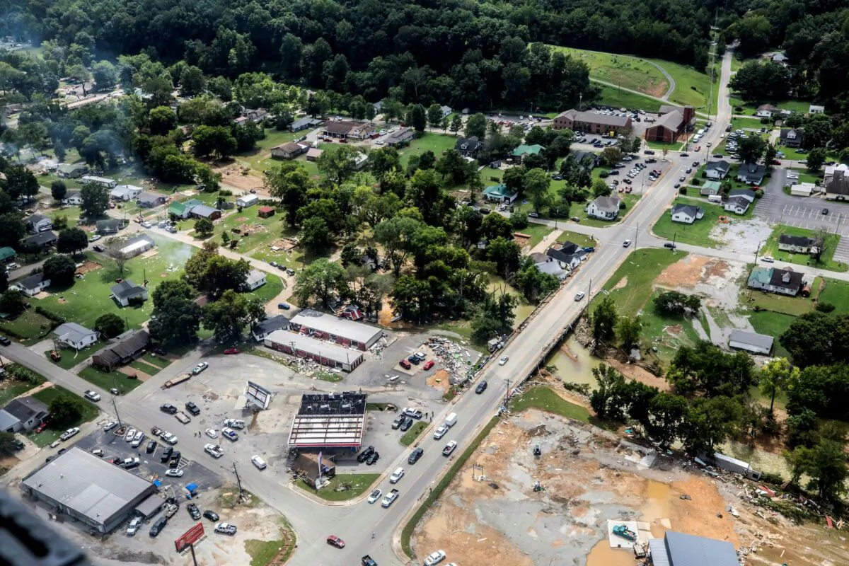 Flood damage is photographed from a Tennessee National Guard UH-60 Black Hawk helicopter flying Gov. Bill Lee to Waverly, Tenn., on Aug. 22, 2021. (Alan Poizner/The Tennessean via AP)