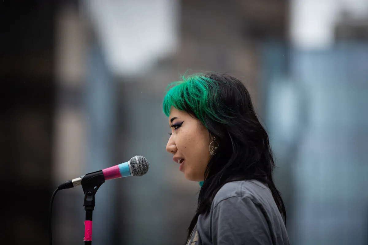 Nursing student Mona Wang attends a demonstration in Vancouver, on July 11, 2020. (The Canadian Press/Darryl Dyck) 