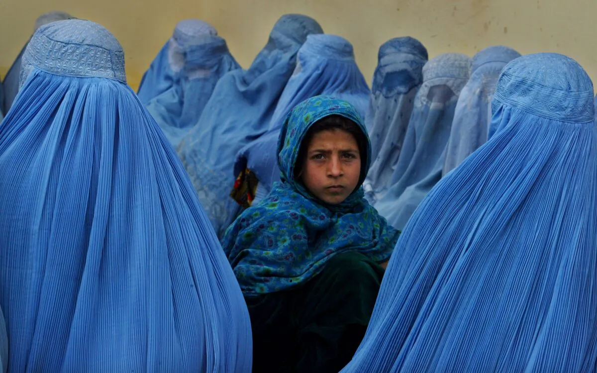 Afghan women wait in line to be treated at the Kalakan health clinic in Kalakan, Afghanistan, in this file photo. (Paula Bronstein/Getty Images)