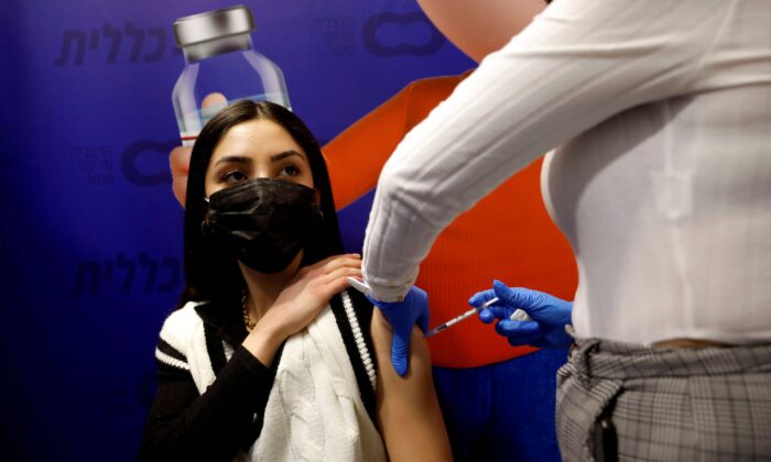 Women will be vaccinated against COVID-19 on February 3, 2021 at the Temporary Clarit Health Maintenance Center in Herzliya, Israel.  (AmirCohen / Reuters)