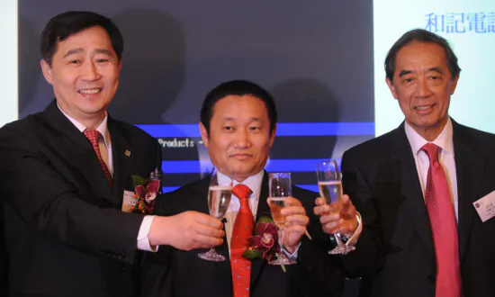 Asia’s ‘Aluminum Tycoon’ Collapses After Three Decades