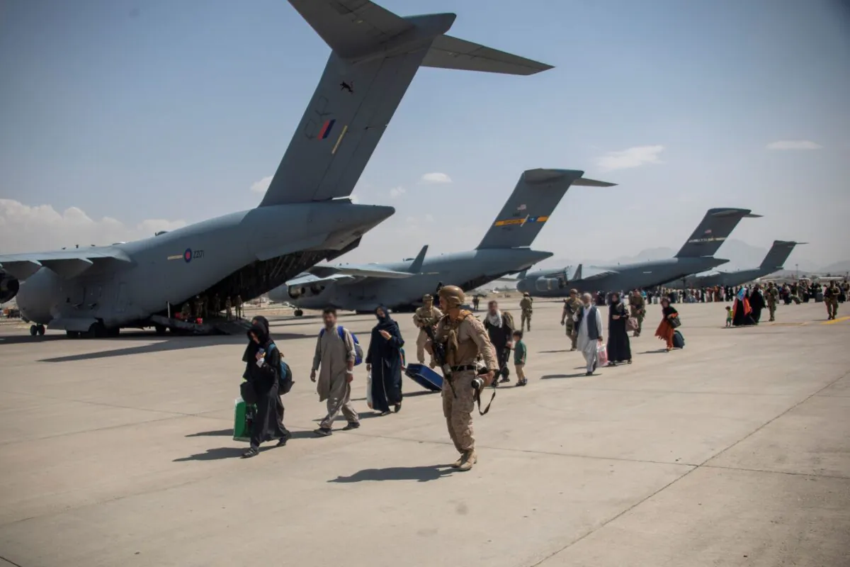 Members of the UK Armed Forces continue to take part in the evacuation of entitled personnel from Kabul airport, in Kabul, Afghanistan, on Aug. 19-22, 2021, in this picture obtained by Reuters, on Aug. 23, 2021. (LPhot Ben Shread/UK MOD Crown copyright 2021/Handout via Reuters)