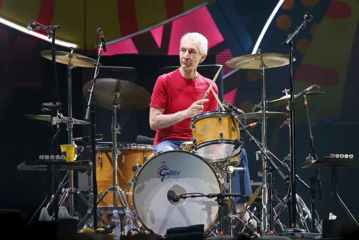 Charlie Watts of British veteran rockers The Rolling Stones performs with his band members Mick Jagger, Keith Richards, and Ronnie Wood during a concert on their Latin America Ole Tour in Santiago, Chile on Feb. 3, 2016. (Rodrigo Garrido/Reuters)
