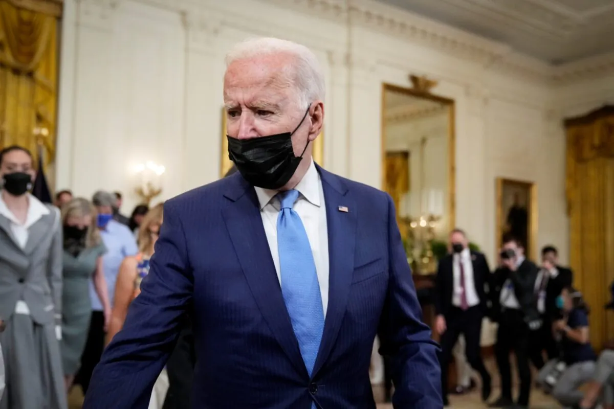 U.S. President Joe Biden departs during an event to honor the 2020 WNBA champions Seattle Storm in the East Room of the White House in Washington on Aug. 23, 2021. (Drew Angerer/Getty Images)
