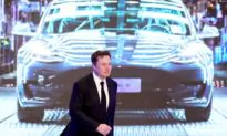 Woman Who Protested Against Tesla at China Auto Show Now Claims Carmaker Is Suing Her