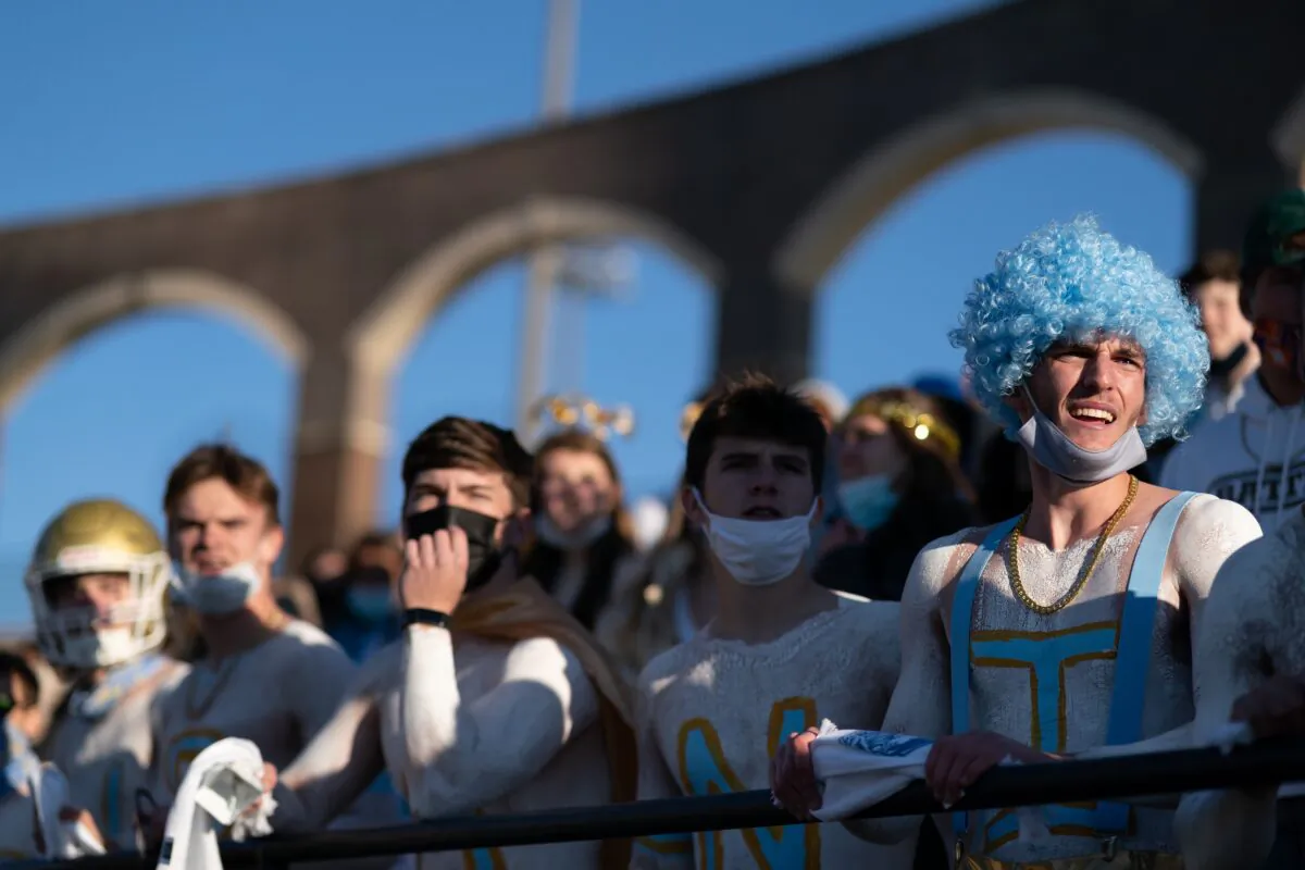 Daniel High School students watch from the stands as a football game takes place in Columbia, S.C., on Dec. 5, 2020. (Sean Rayford/Getty Images)
