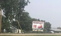 In South Dakota, the Road Signs Lead to the Wall