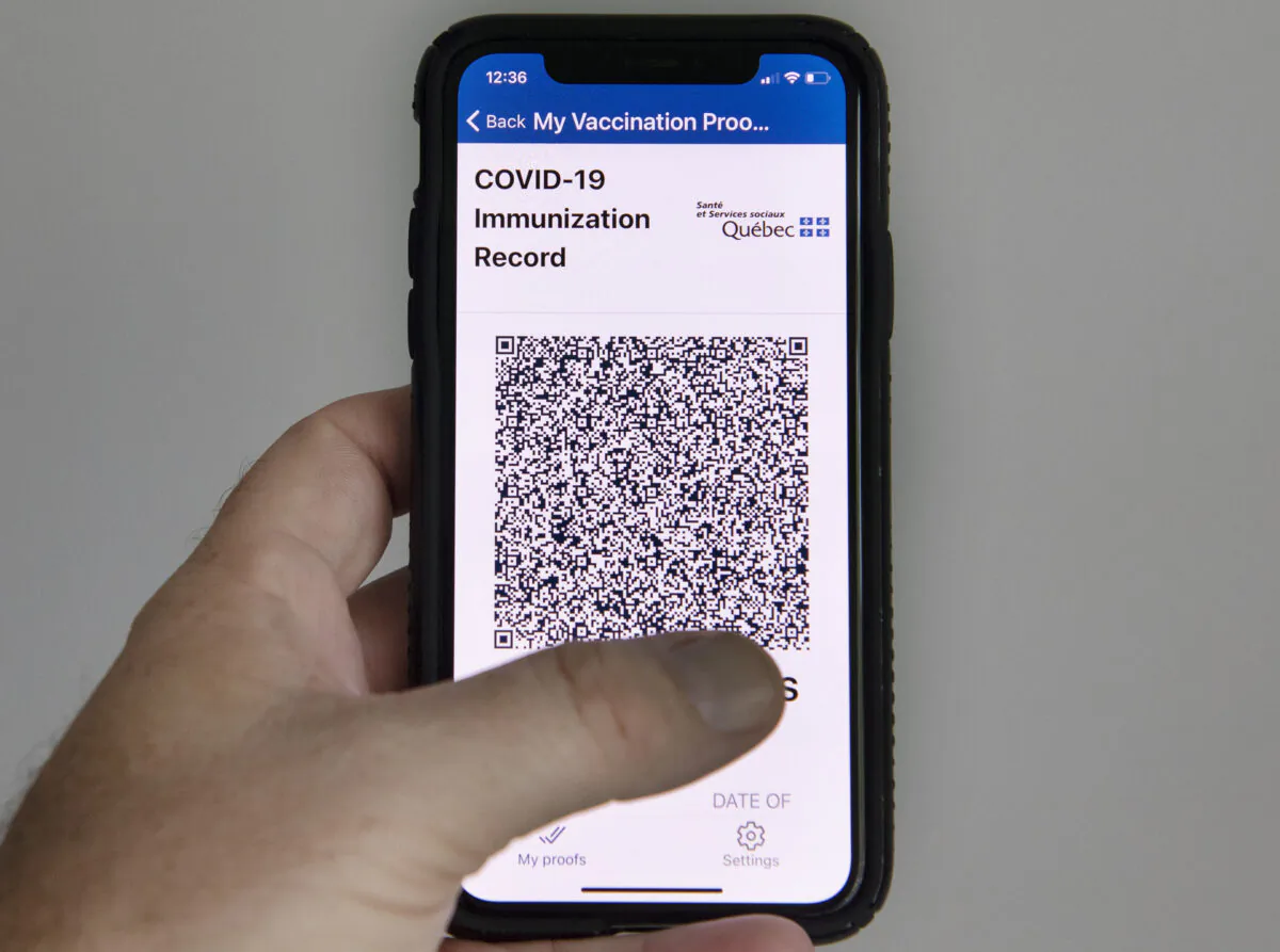 The Quebec government's new vaccine passport called VaxiCode is shown on a phone in Montreal on Aug. 25, 2021. (The Canadian Press/Graham Hughes)