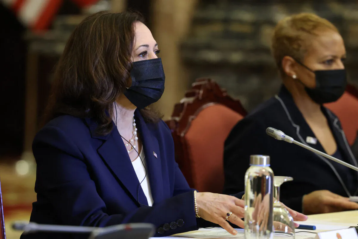 U.S. Vice President Kamala Harris meets Vietnam's President Nguyen Xuan Phuc during a bilateral meeting at the Mirror Room of the Presidential Palace, in Hanoi, Vietnam, on Aug. 25, 2021. (Evelyn Hockstein/POOL/AFP via Getty Images)