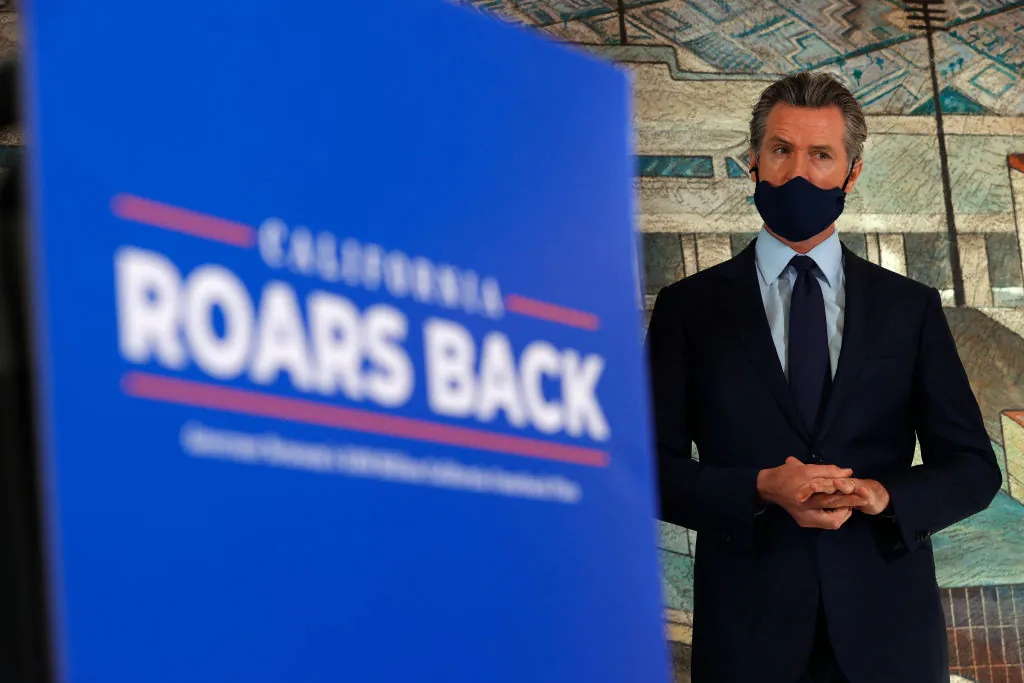 California Gov. Gavin Newsom looks on during a press conference in Oakland, Calif., on May 10, 2021. (Justin Sullivan/Getty Images)