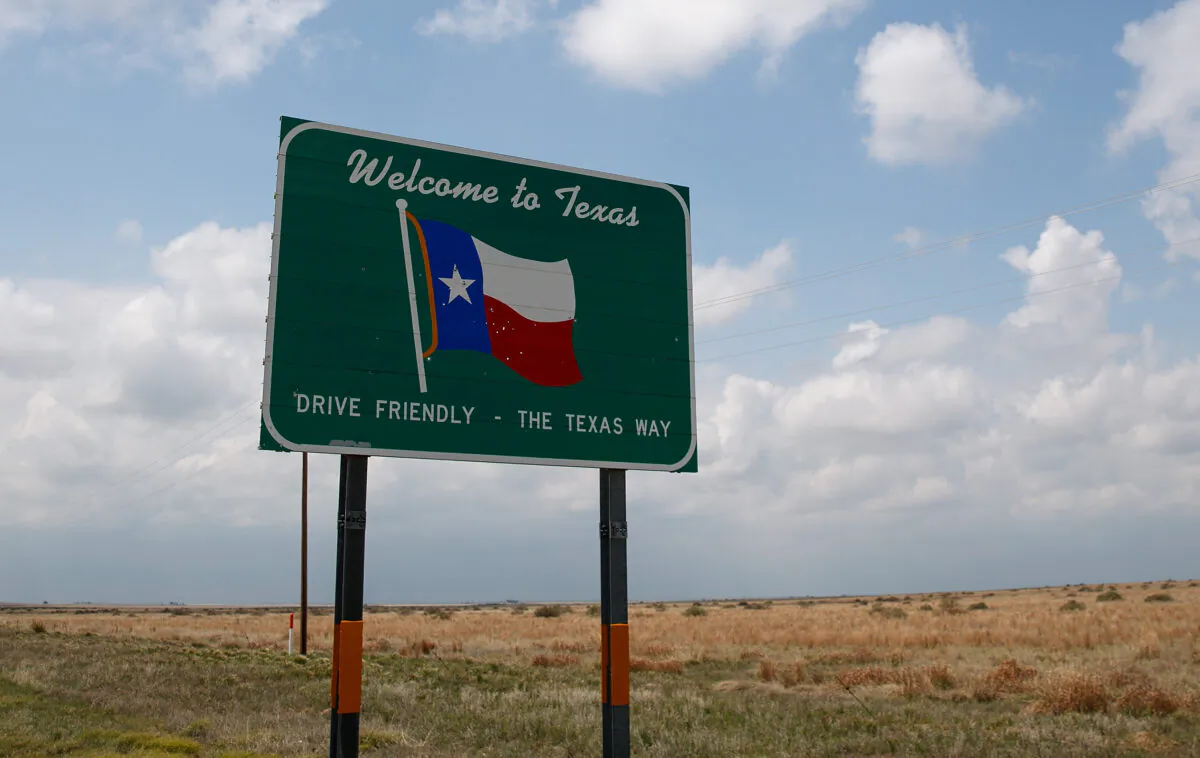 A 'Welcome to Texas' sign stands on the side of the road near Dalhart, Texas, on May 9, 2017. (Drew Angerer/Getty Images)