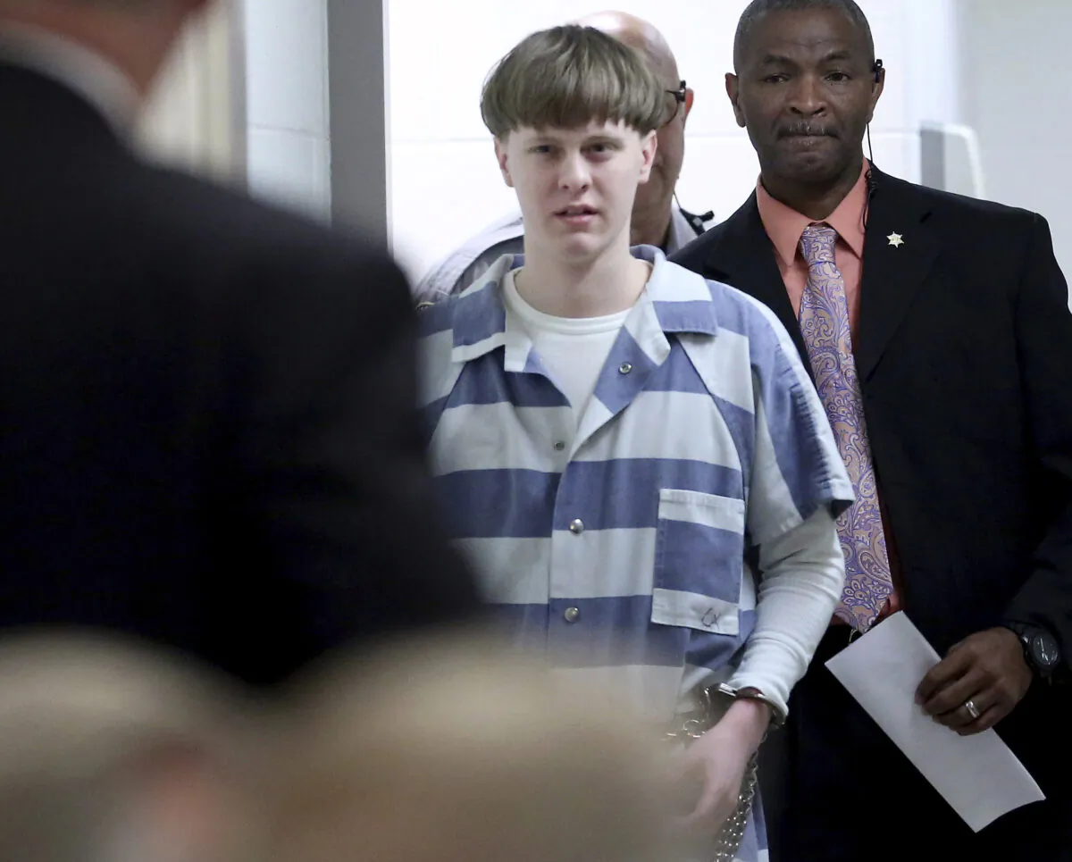 Dylann Roof enters the court room at the Charleston County Judicial Center to enter his guilty plea on murder charges in Charleston, S.C. on April 10, 2017. (Grace Beahm/The Post And Courier via AP)