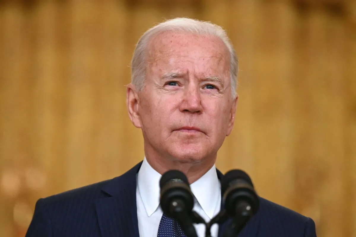 President Joe Biden delivers remarks on the terror attack at Hamid Karzai International Airport, and the U.S. service members and Afghan victims killed and wounded, in the East Room of the White House, Washington, on Aug. 26, 2021. (Jim Watson/AFP via Getty Images)