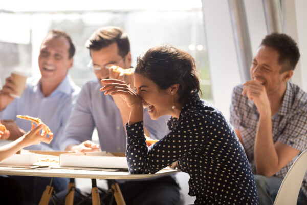 friends laughing at meeting