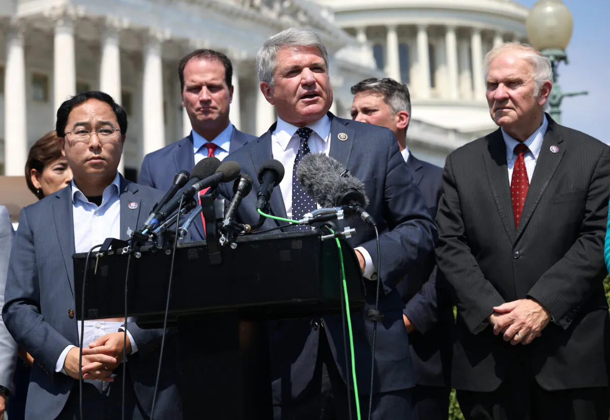 Rep. Michael McCaul (R-Texas), joined by a bipartisan group of lawmakers, speaks at a news conference on the ongoing Afghanistan evacuations, at the U.S. Capitol in Washington on Aug. 25, 2021. (Kevin Dietsch/Getty Images)