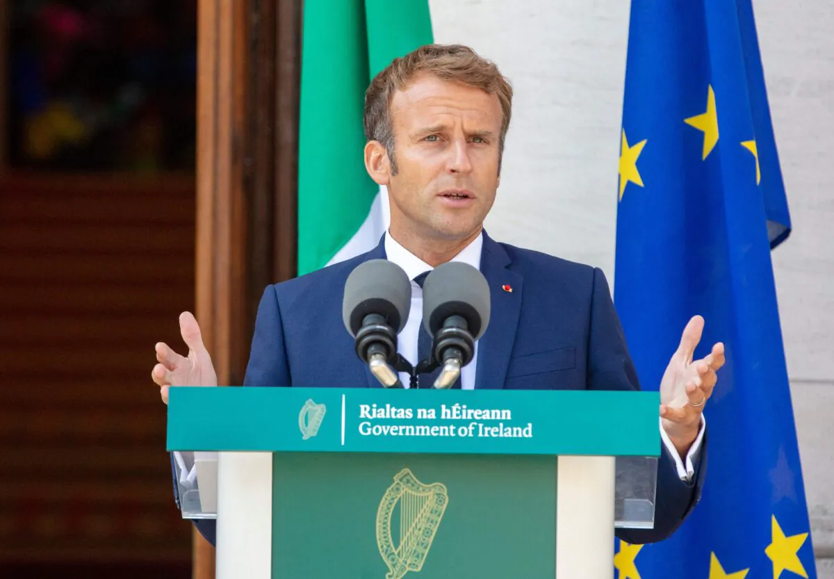 France's President Emmanuel Macron speaks during a joint press conference with Irish Prime Minister Micheal Martin (unseen) following their meeting at Government Buildings in Dublin on Aug. 26, 2021. (Paul Faith/AFP via Getty Images)
