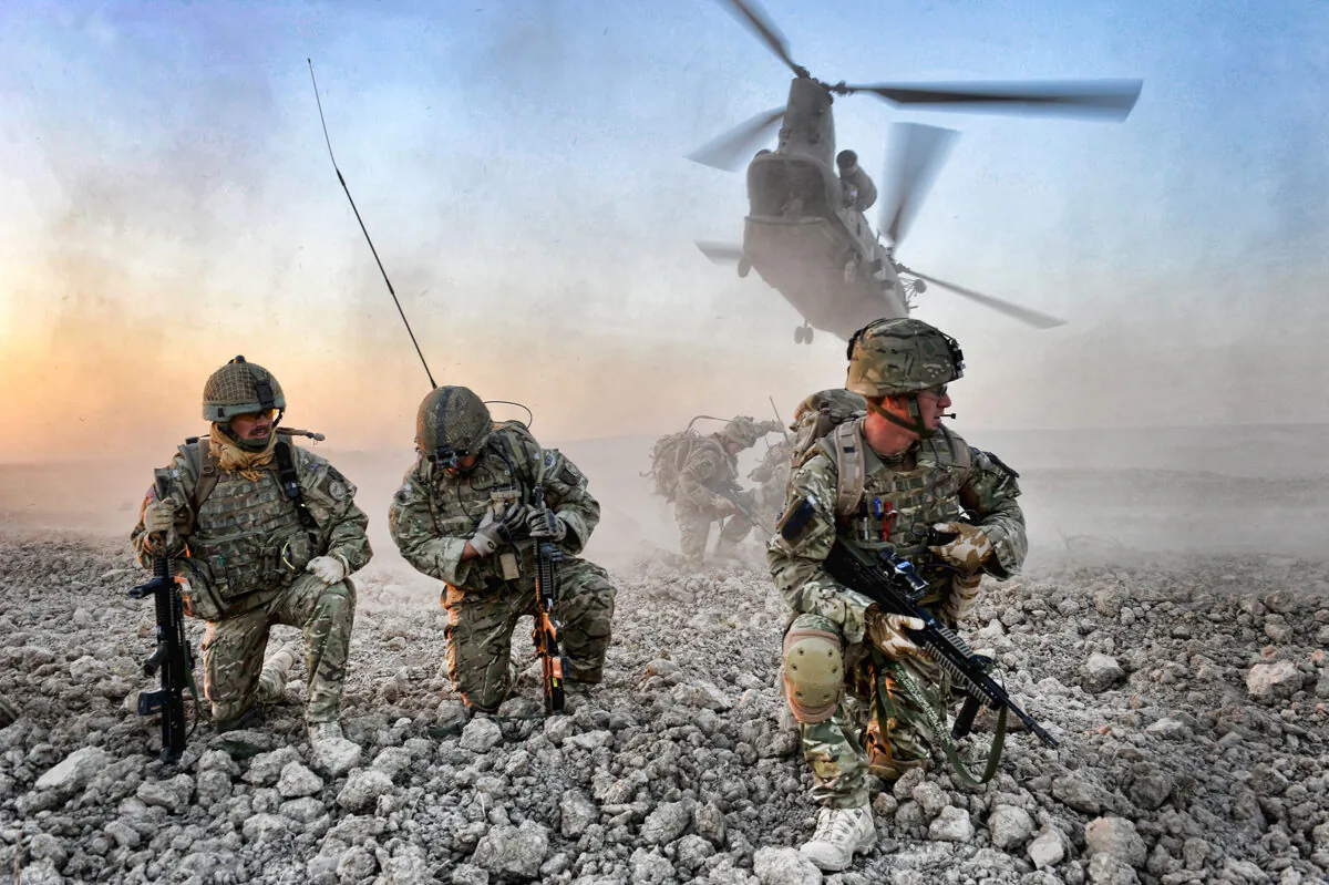 An air insertion operation mounted by British soldiers and Afghan police in Afghanistan, in an undated handout photo. (MoD/PA)