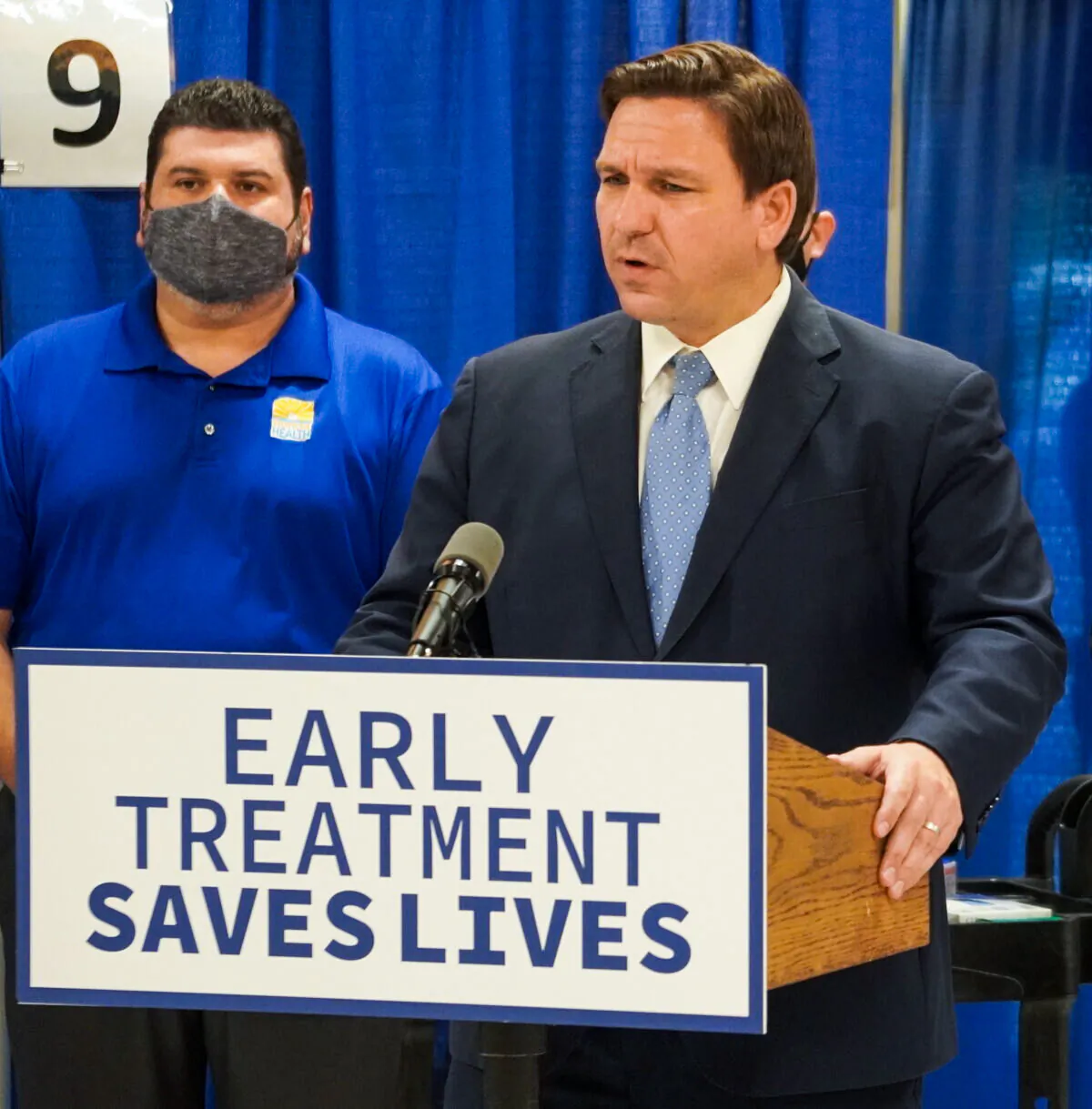 Florida Gov. Ron DeSantis speaks to reporters during a press conference opening up an infusion site in Charlotte County, Fla. (Jann Falkenstern/The Epoch Times)