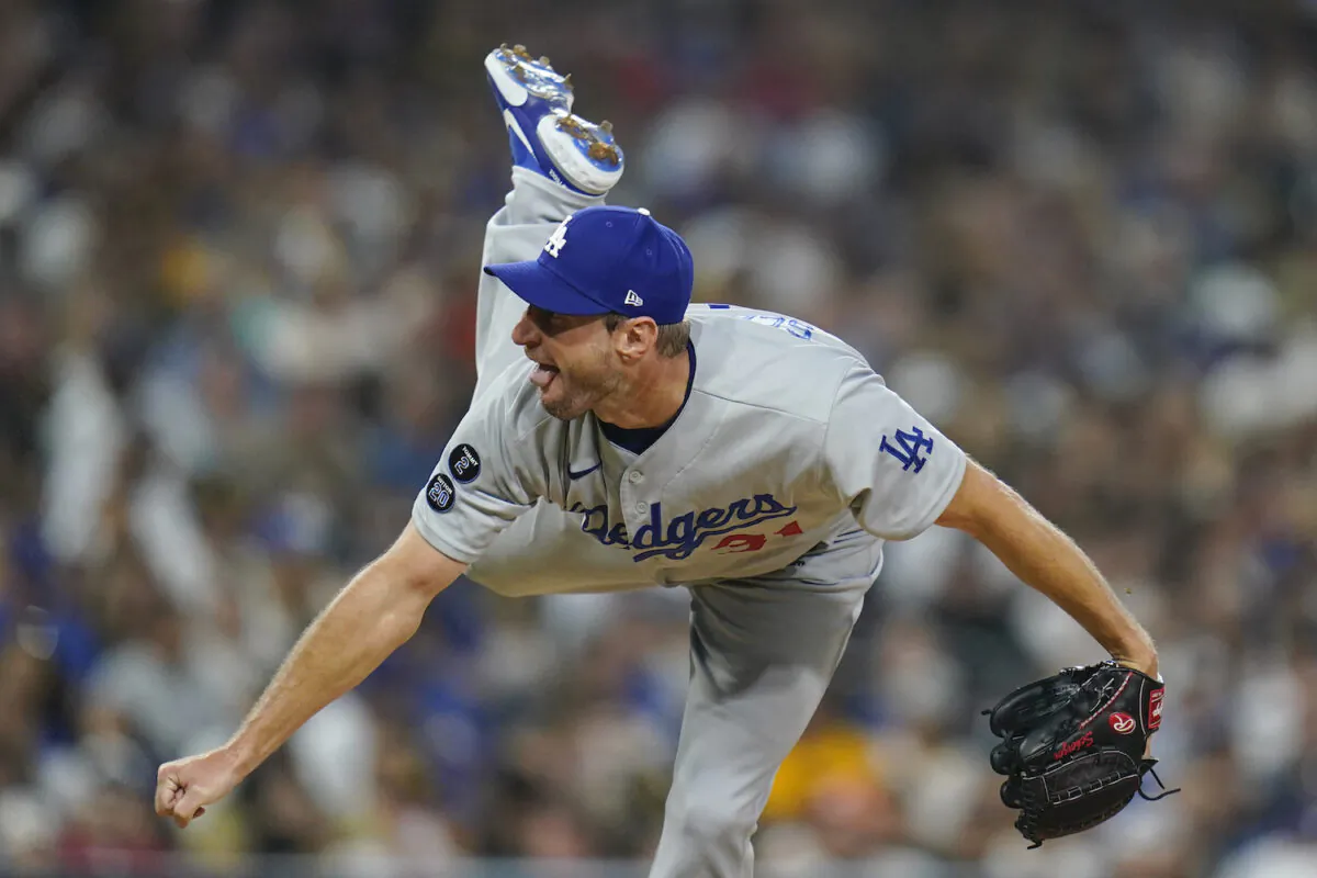 Los Angeles Dodgers starting pitcher Max Scherzer works against a San Diego Padres batter during the fourth inning of a baseball game in San Diego, Calif., on Aug. 26, 2021. (AP Photo/Gregory Bull)
