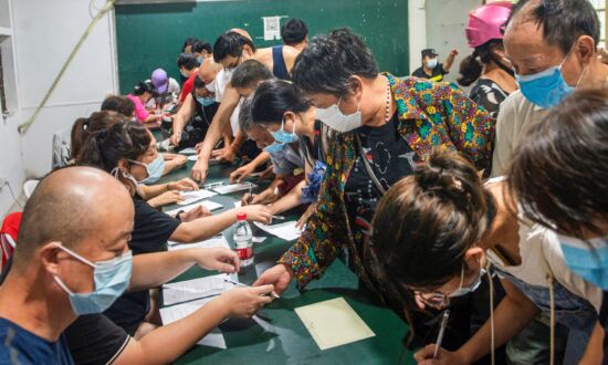 Chinese Official Sets 1.1 Billion Vaccination Target by October to ‘Win People’s War’