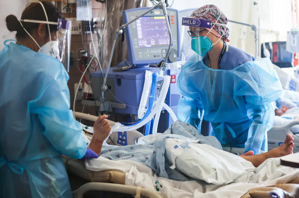A registered nurse cares for COVID-19 patients in an intensive care unit at Harbor-UCLA Medical Center in Torrance, Calif., on Jan. 21, 2021. (Mario Tama/Getty Images)