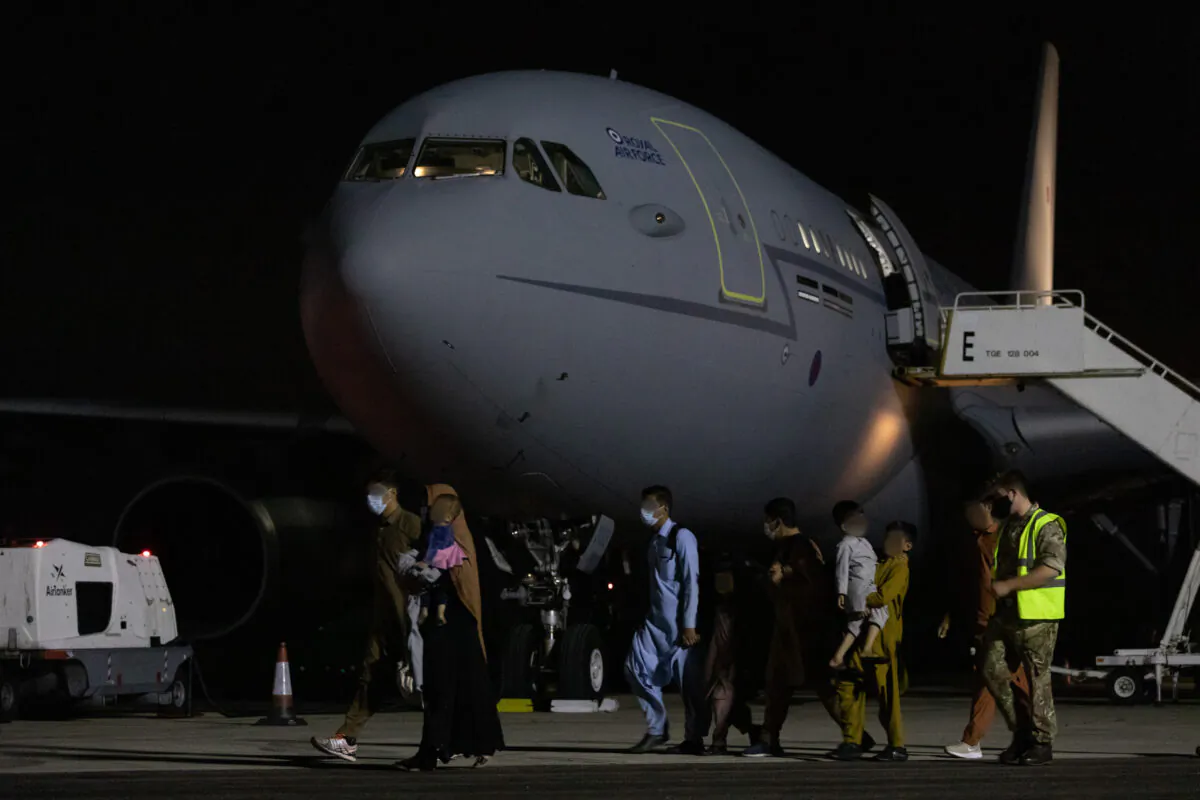 Arrivals at RAF Brize Norton who have been evacuated from Afghanistan, in an undated file photo. (Cpl Will Drummee RAF/Ministry of Defence/PA)