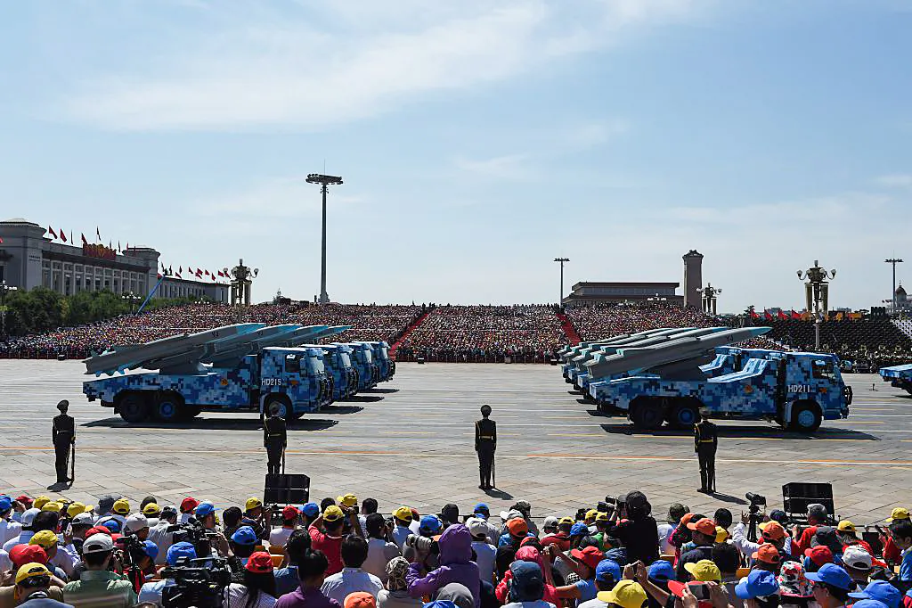 Military vehicles carrying cruise missiles are displayed in a military parade at Tiananmen Square in Beijing on Sept. 3, 2015. (Greg Baker/AFP/Getty Images)
