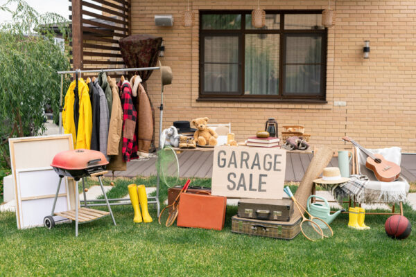 Garage,Sale,In,Backyard:,Various,Toys,,Household,Stuff,And,Clothes