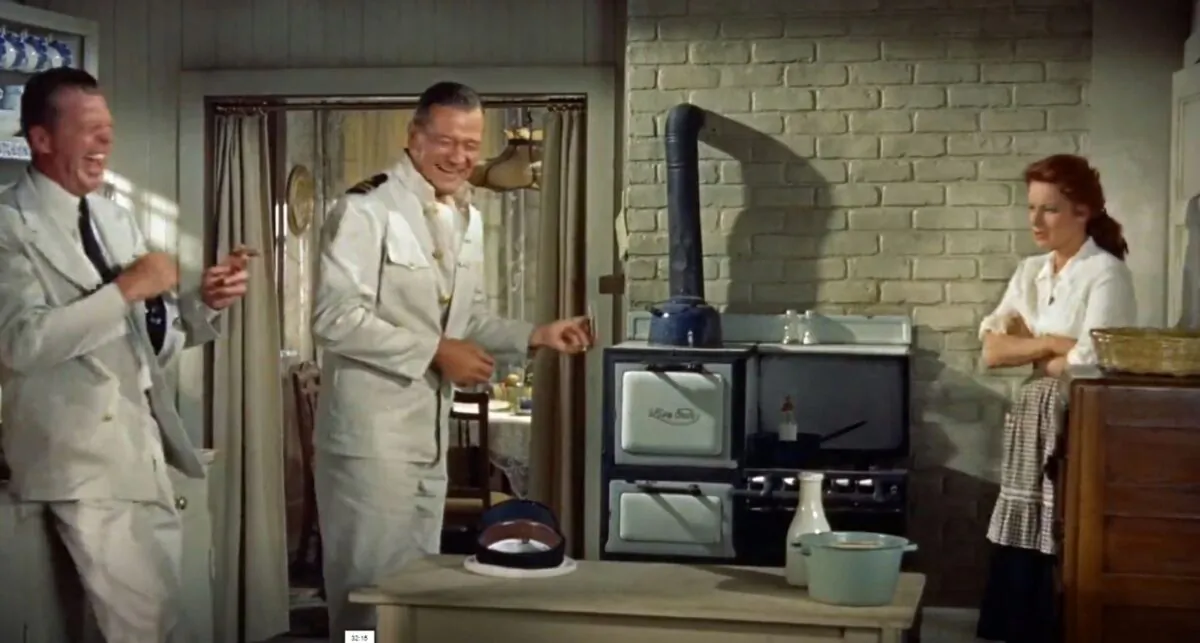 (L–R) “Jughead” Carson (Dan Dailey), Frank (John Wayne), and Minnie Wead (Maureen O’Hara), in “The Wings of Eagles.” (Metro-Goldwyn-Mayer)