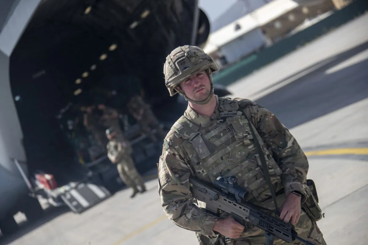 UK military personnel boarding a A400M aircraft departing Kabul, Afghanistan, on Aug. 28, 2021. (Jonathan Gifford/MoD via AP)