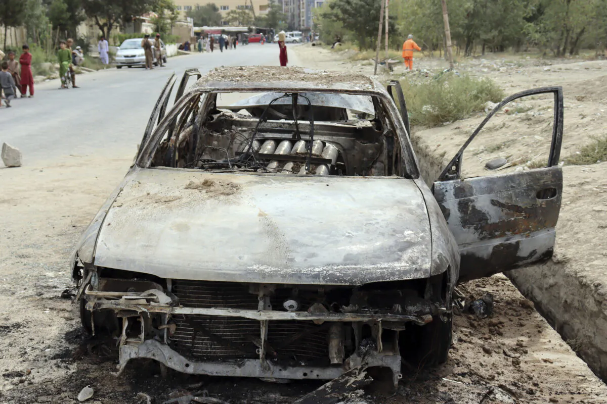 Rocket launcher tubes are seen in a destroyed vehicle vehicle in Kabul, Afghanistan, on Aug. 30, 2021. (Khwaja Tawfiq Sediqi/AP Photo)