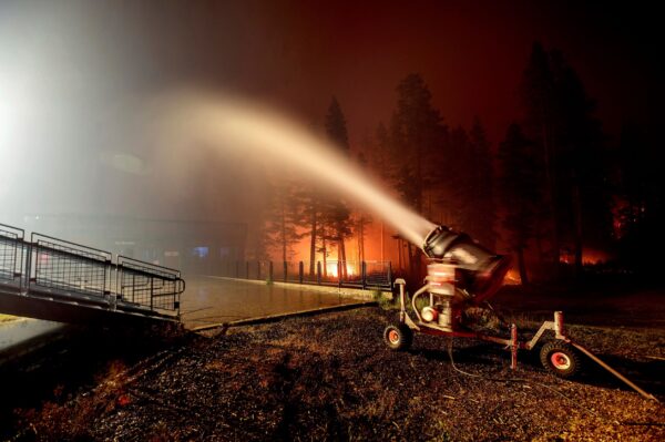 a snowmaking machine blasts water