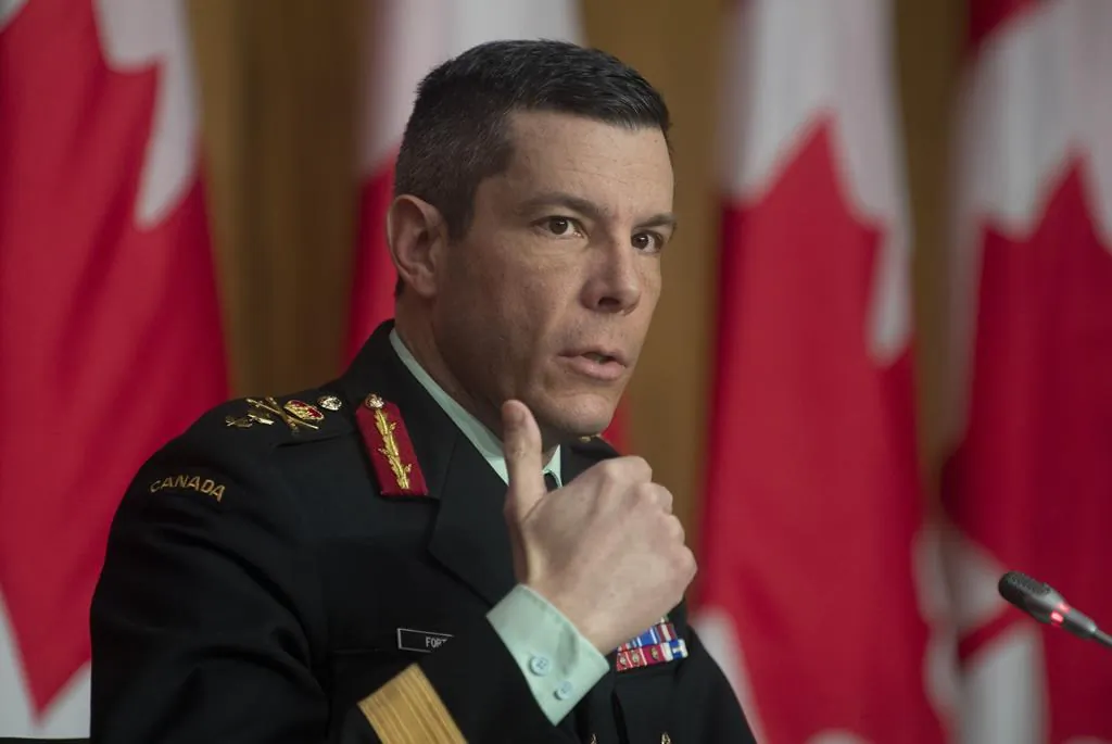 Major General Dany Fortin responds to a question on COVID vaccines during a news conference, on January 14, 2021 in Ottawa. (The Canadian Press/Adrian Wyld)