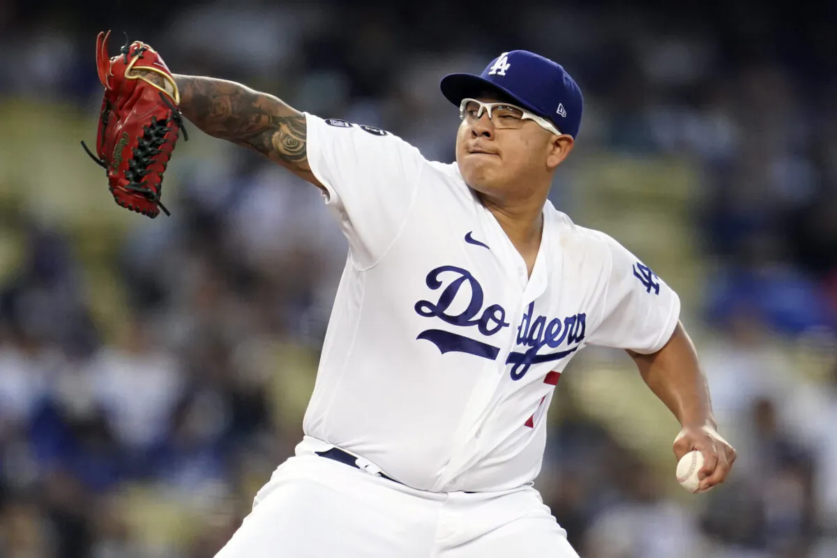 Los Angeles Dodgers starting pitcher Julio Urias throws during the first inning of a baseball game against the Atlanta Braves in Los Angeles on Aug. 30, 2021. (AP Photo/Marcio Jose Sanchez)